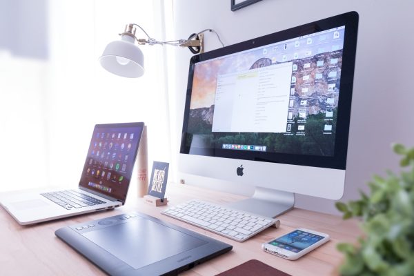 Apple devices on a table.