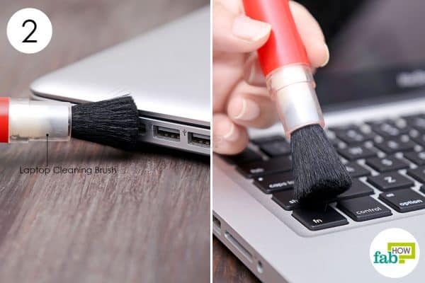 laptop plugged in not charging by cleaning laptop ports