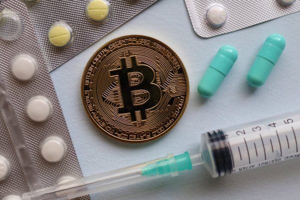 Bitcoin symbol with drugs