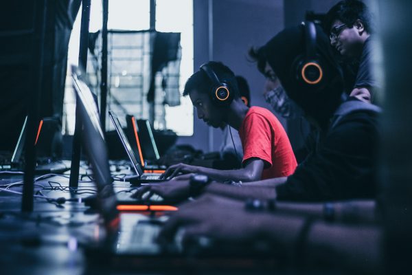 men playing games on their laptop