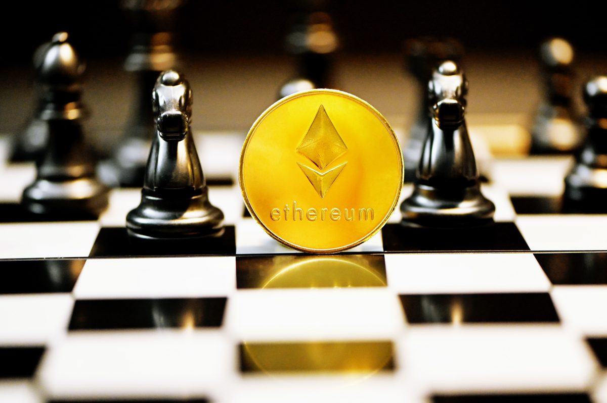 Ethereum token on a chess board with some chess pieces