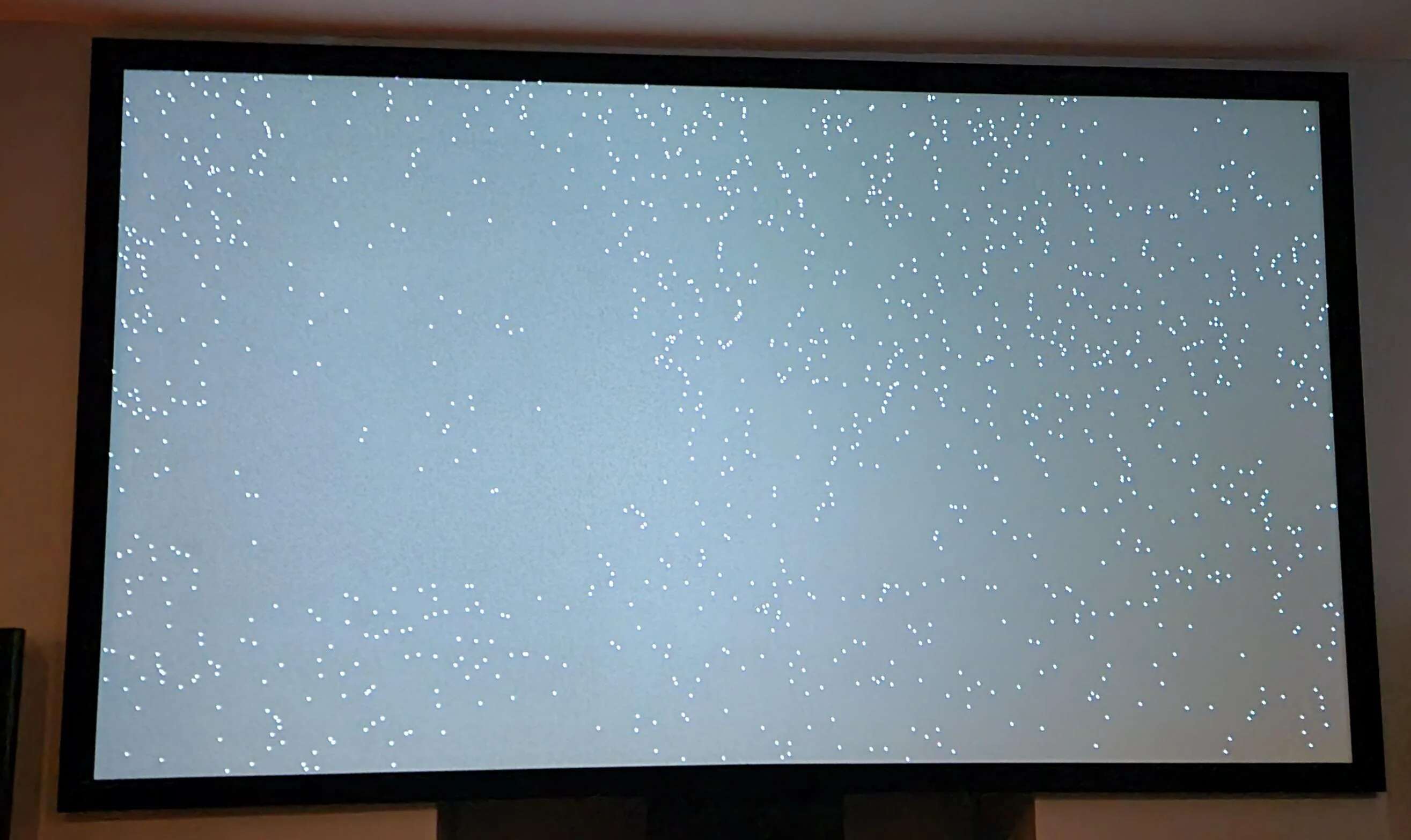 How To Fix White Dots On Projector Screen