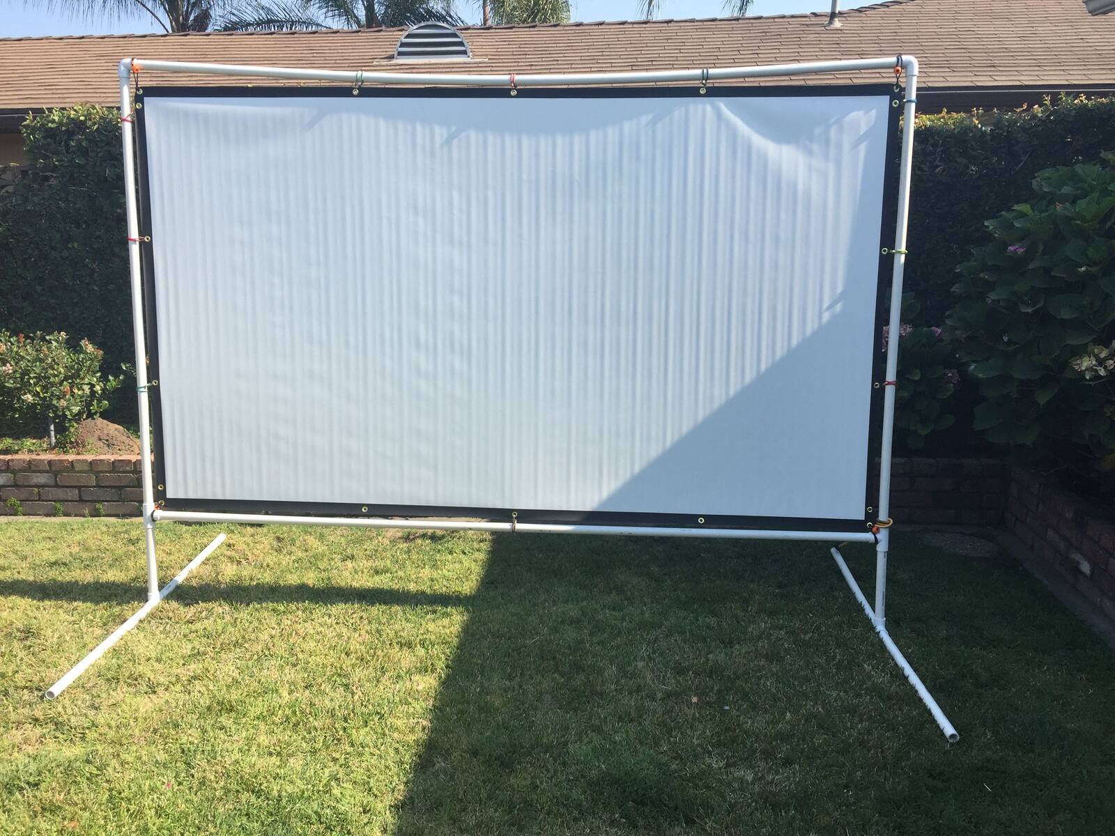 How To Hang Projector Screen Outside