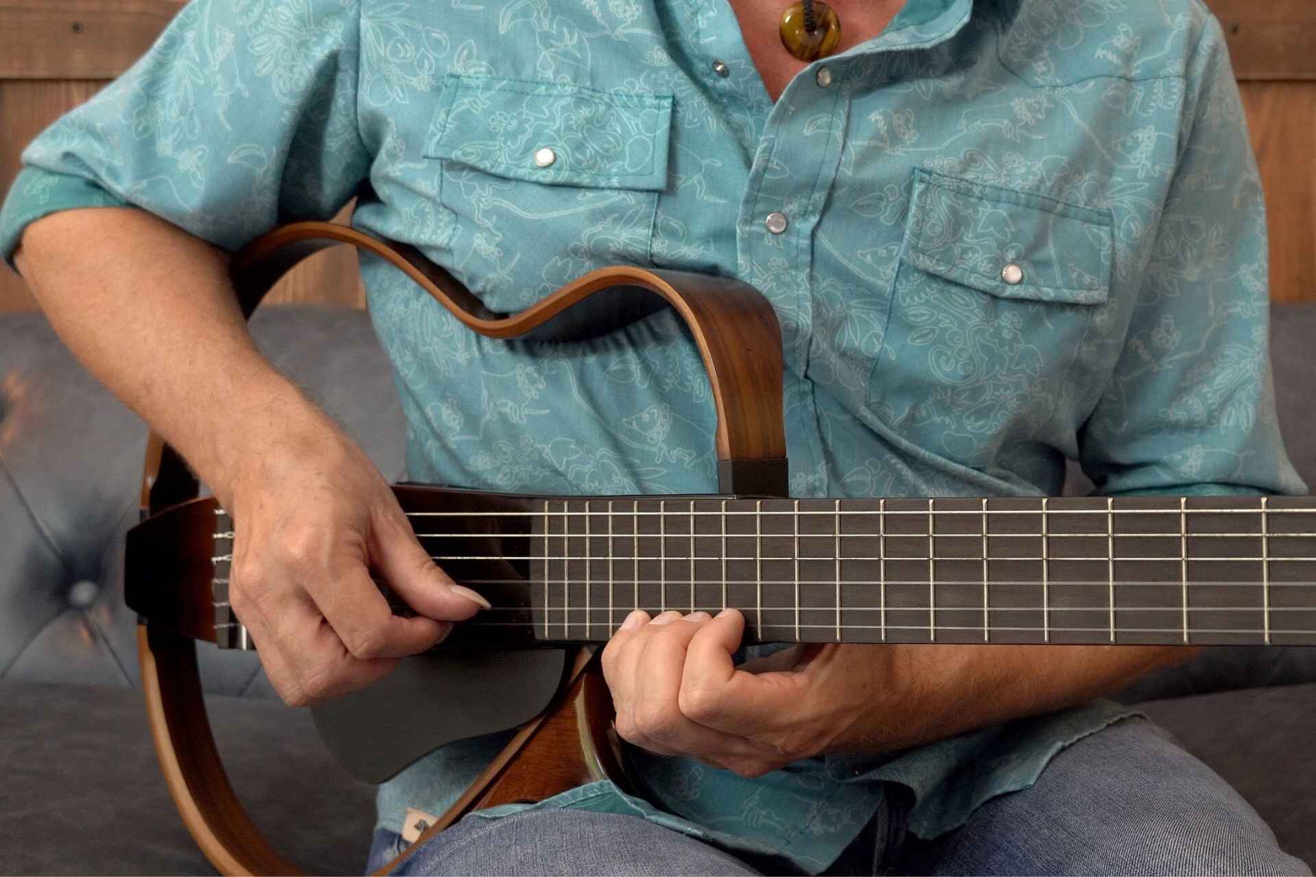 Double Note When Fingering High On The Fretboard On An Acoustic Guitar