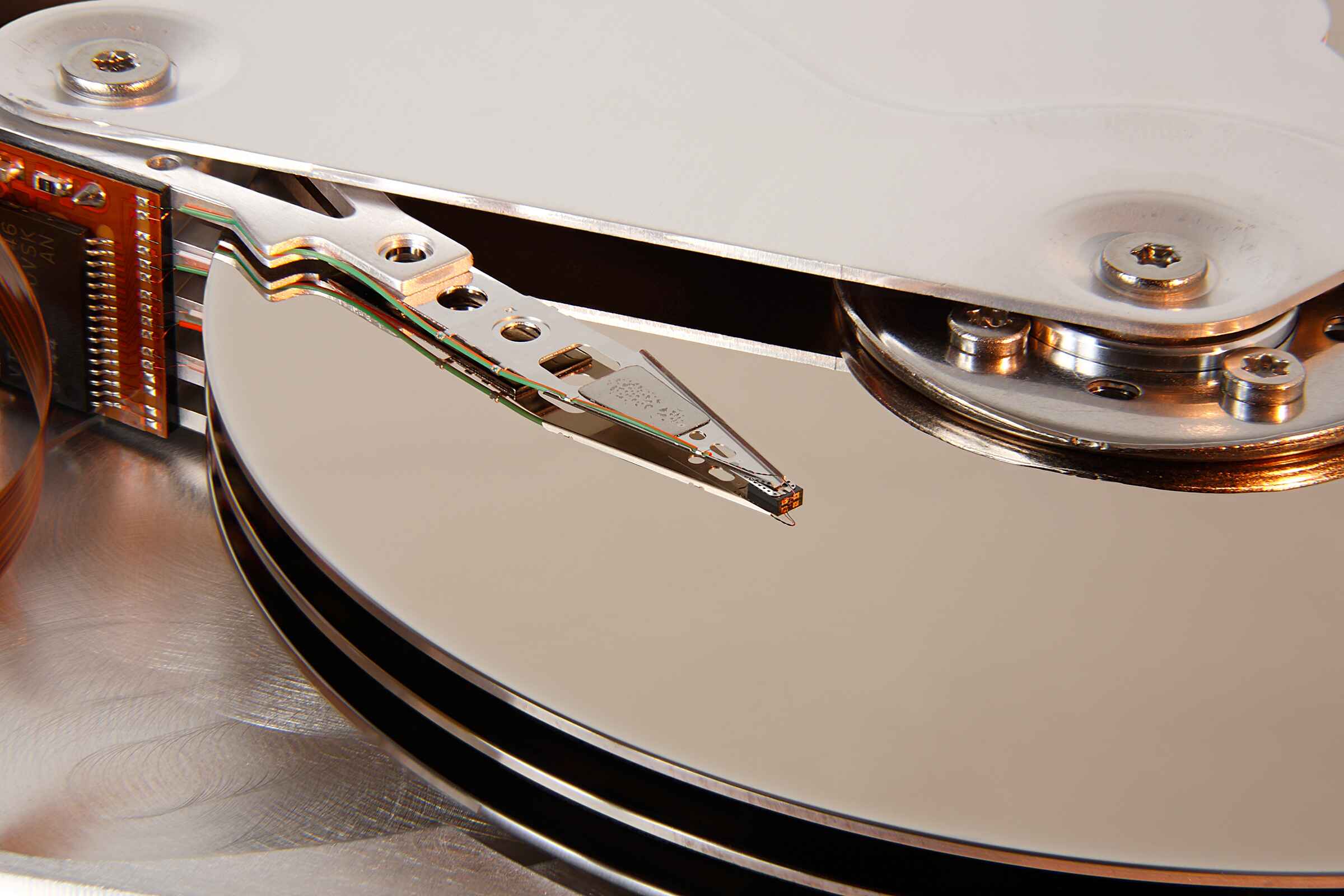 how-many-tiny-read-write-heads-service-each-platter-in-a-traditional-hard-disk-drive-hdd