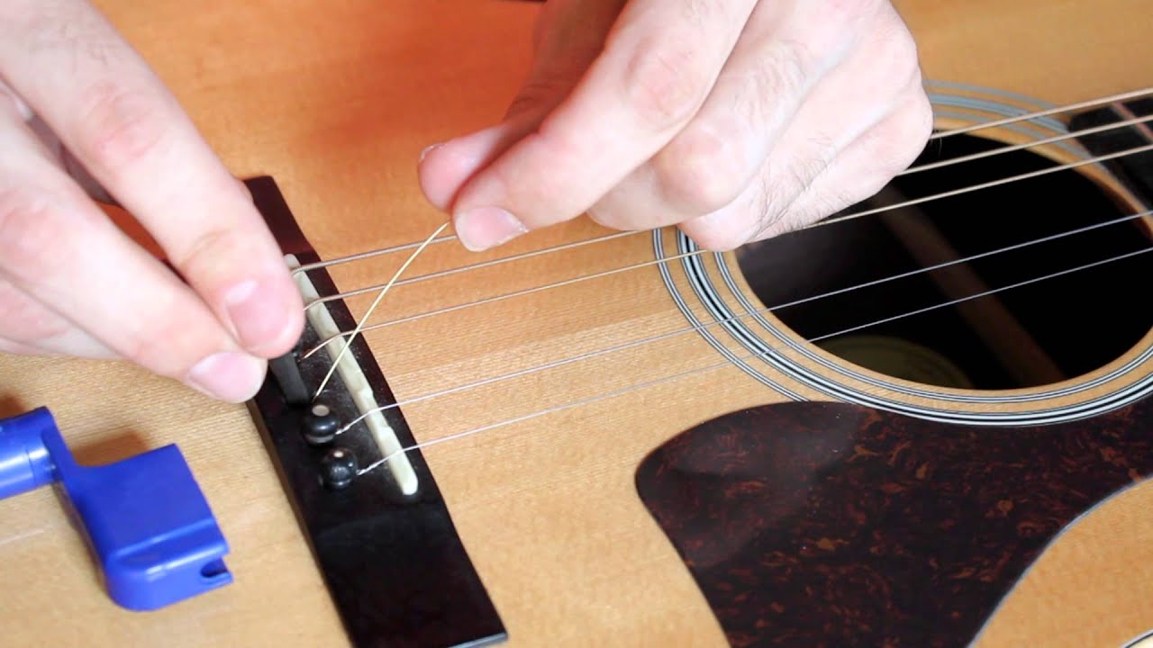 How To Change Acoustic Guitar Strings Safely