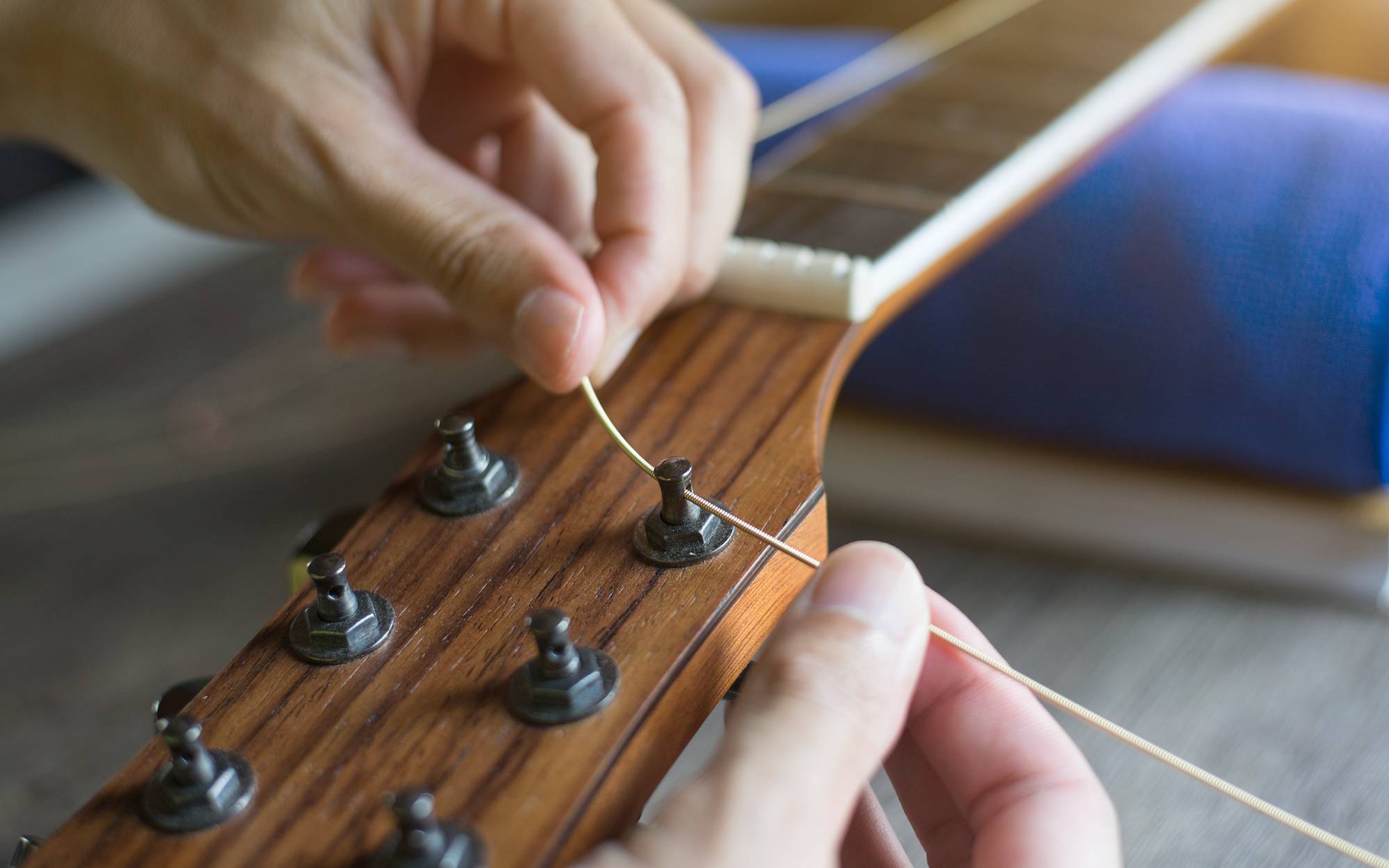How To Change Strings On An Acoustic Guitar With Pegs
