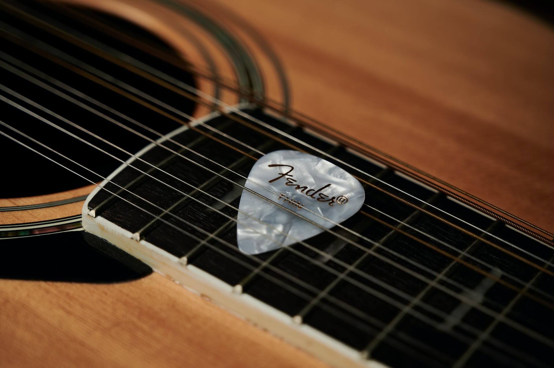 How To Get A Pick Out Of An Acoustic Guitar