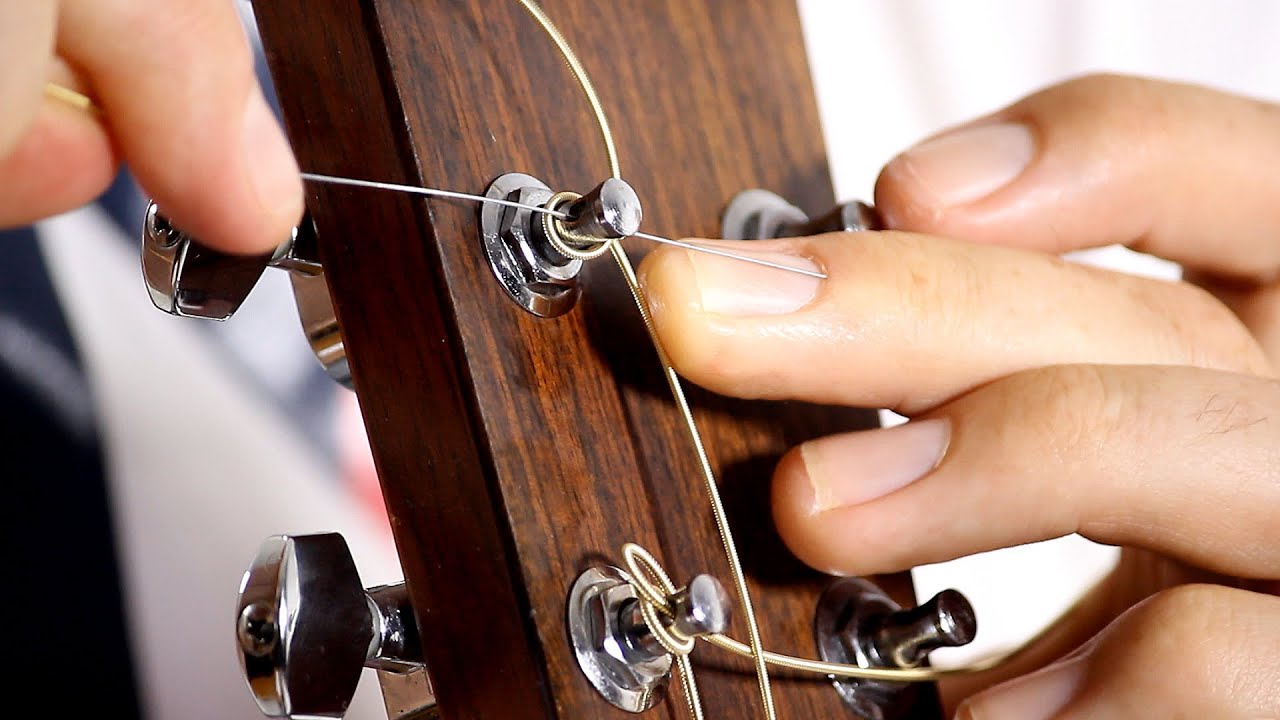 How To Replace Strings On Acoustic Guitar
