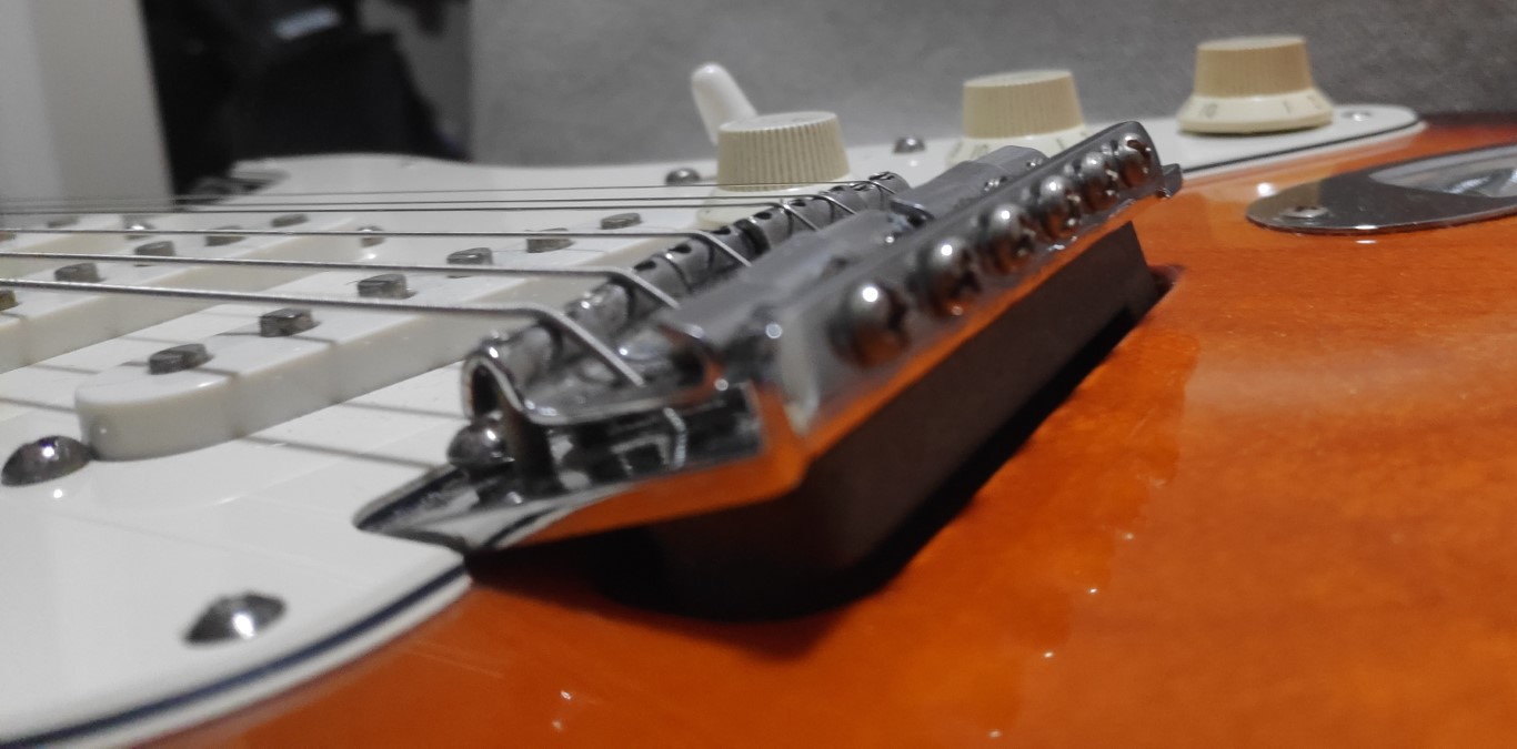 How To Restring An Electric Guitar With A Floating Bridge