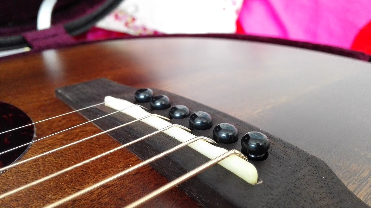 How To Take Out Pins On Acoustic Guitar