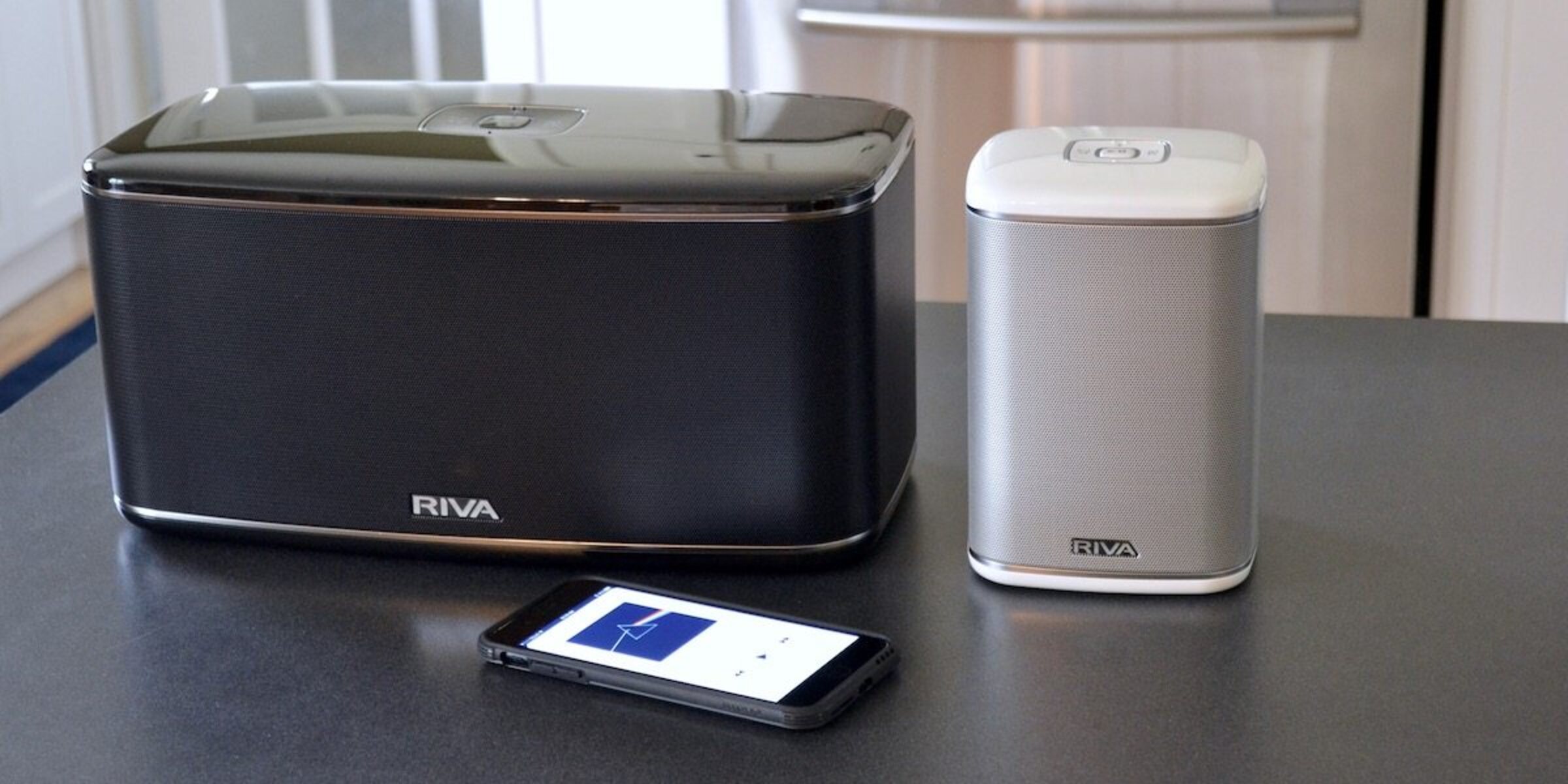What Does The Riva Premium Wireless Smart Speaker System Come With?