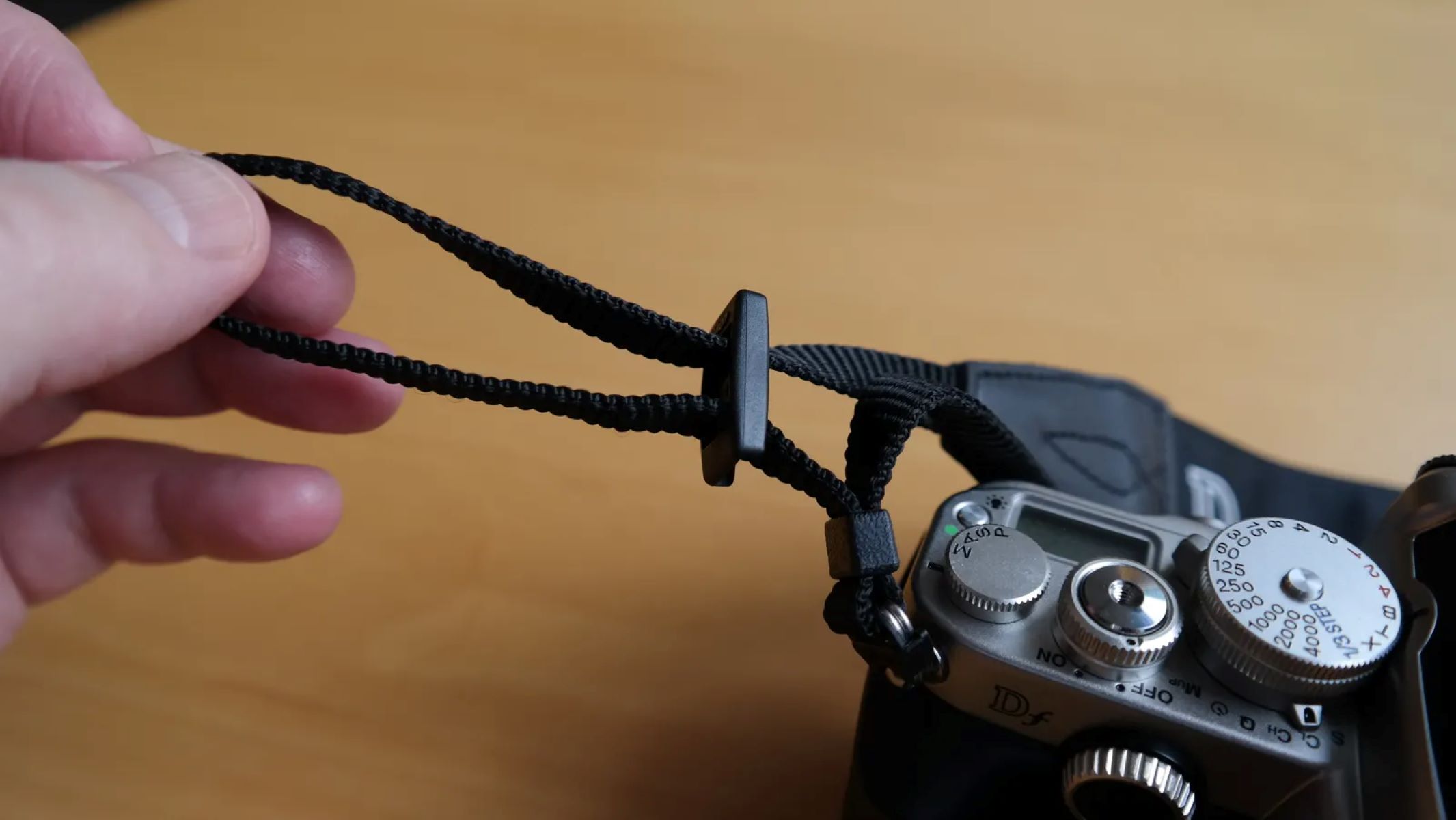 How To Fit A DSLR Camera Strap